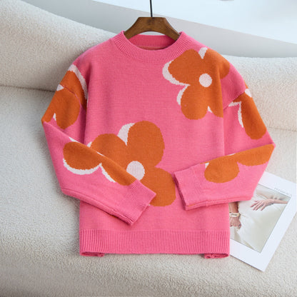 Pull en tricot décontracté pour femmes avec un grand motif floral et un col haut Chic und Stil