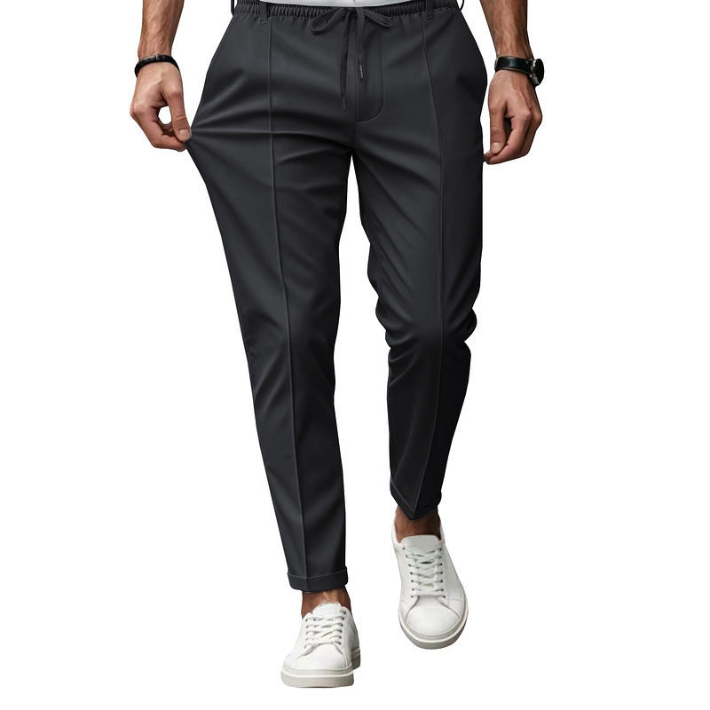 Men's fashionable sports pants with elastic waistband and practical welt pockets Chic and Style