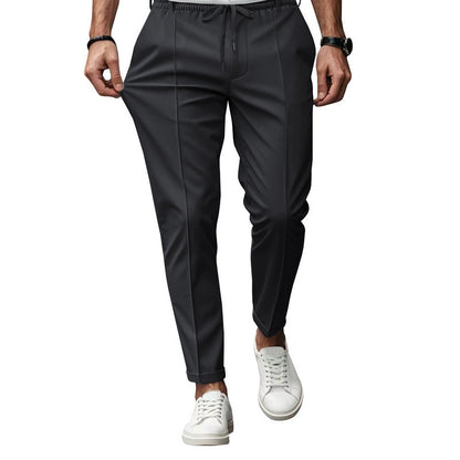 Men's fashionable sports pants with elastic waistband and practical welt pockets Chic and Style