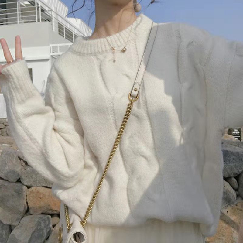 Pull-over en grosse laine pour femmes avec design en torsades à la mode et coupe large Chic und Stil