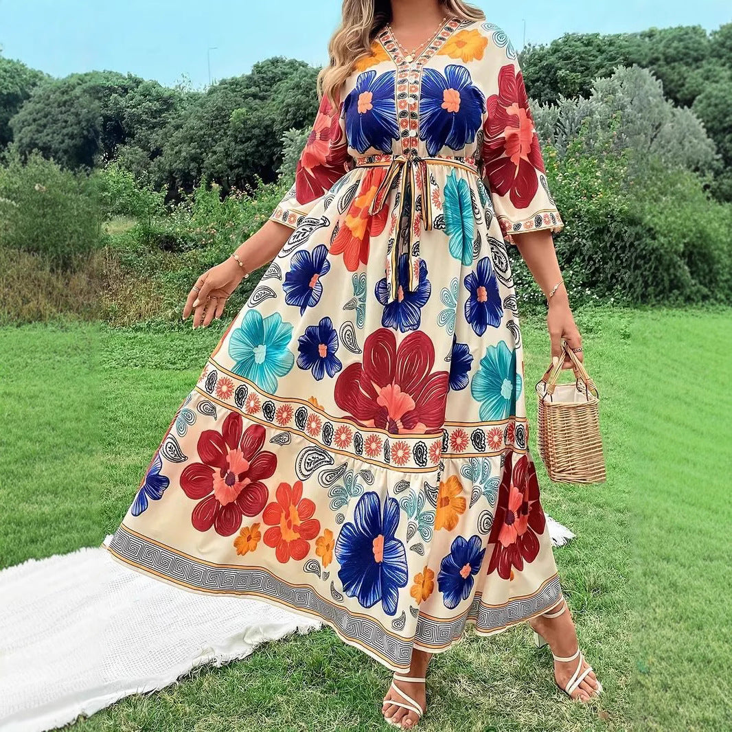 Robe maxi femme avec design floral coloré et ceinture à la taille Chic und Stil
