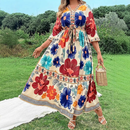Robe maxi femme avec design floral coloré et ceinture à la taille Chic und Stil