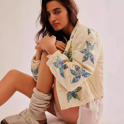 Dame veste matelassée avec broderies florales Chic und Stil