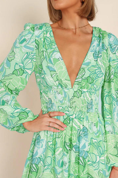 Robe d'été à motifs floraux pour femmes avec décolleté en V profond et manches bouffantes Chic und Stil