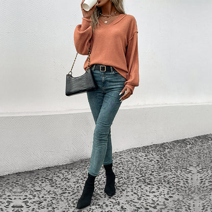 Pull femme décontracté avec décolleté en V et manches bouffantes Chic und Stil