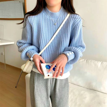 Pull en gros tricot pour femmes avec encolure ras du cou et boutons décoratifs Chic und Stil