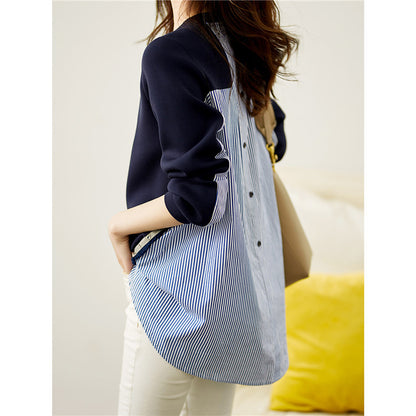 Casual women's sweatshirt with a unique layered design and contrasting details Chic and Style