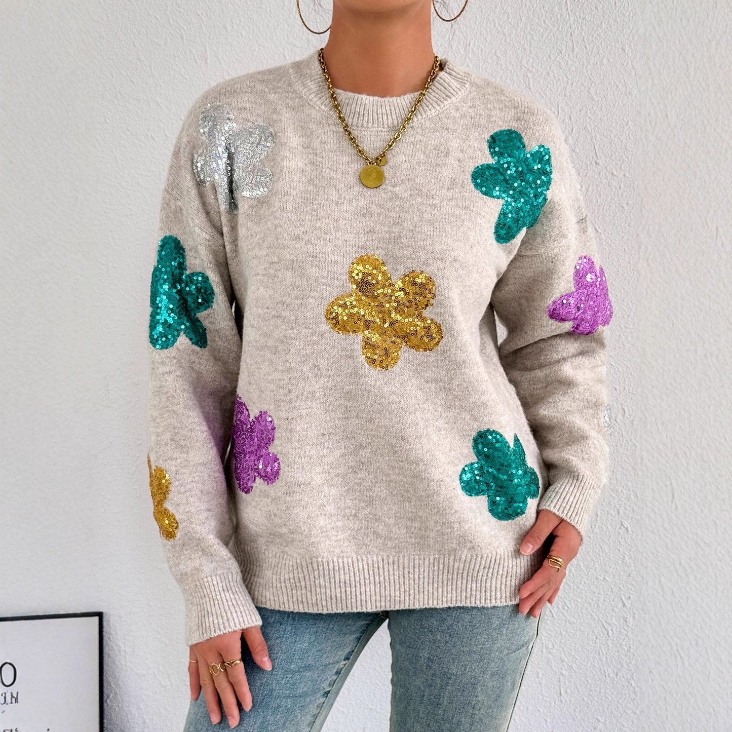 Pull en tricot pour femmes avec des appliqués de fleurs scintillants Chic und Stil