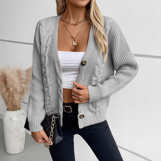 Cardigan pour femmes avec motif en torsade et détails de boutons Chic und Stil