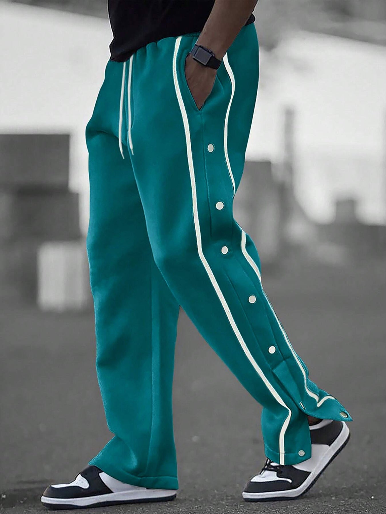 Stylish men's sports pants with snap button details and side pockets Chic and Style