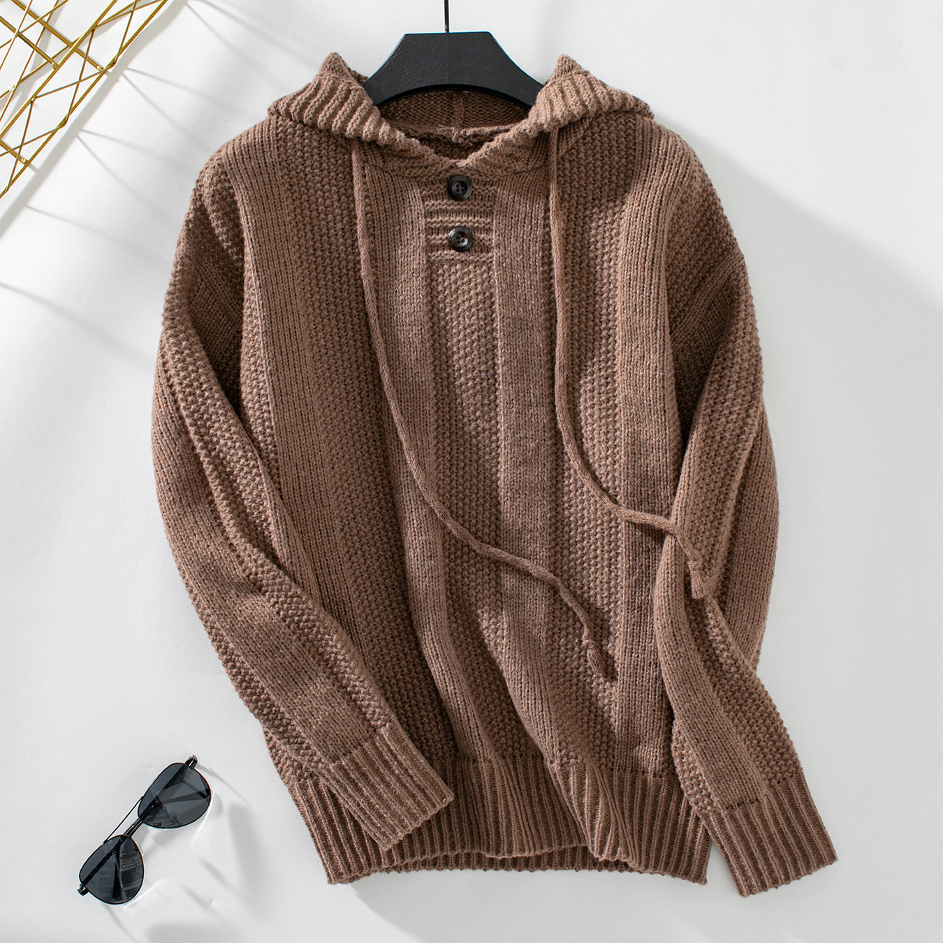 Pull en tricot décontracté pour dames avec capuche et détails de bouton Chic und Stil