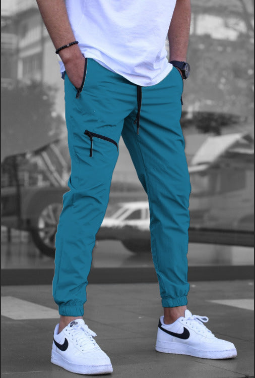 Light sporty pants for men with side zip pockets Chic and Style