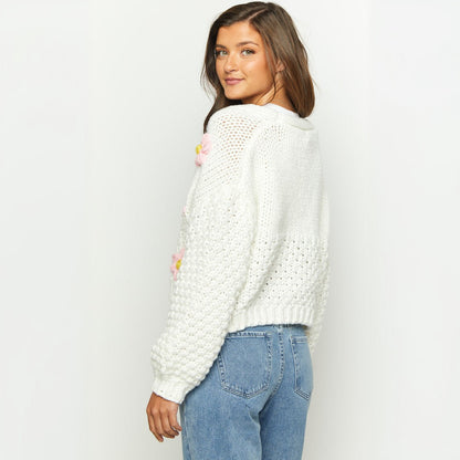Cardigan femme avec appliques florales Chic und Stil