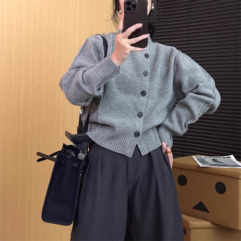 Cardigan femme avec détails de boutons et manches à larges côtes Chic und Stil