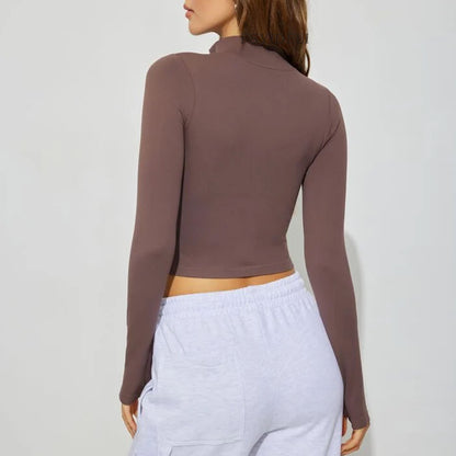 Chemise de sport à zip pour femmes avec manches longues et col montant Chic und Stil