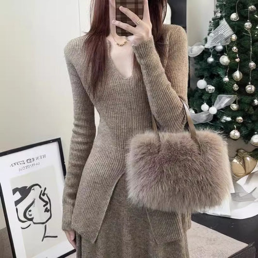 Robe en tricot pour dames avec une fente élégante et un design structuré Chic und Stil