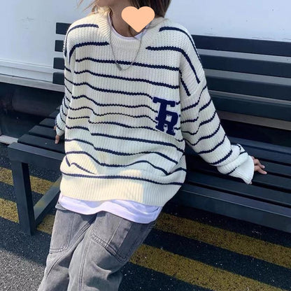 Pull en tricot surdimensionné décontracté pour femmes avec des rayures cassées et une poche poitrine Chic und Stil