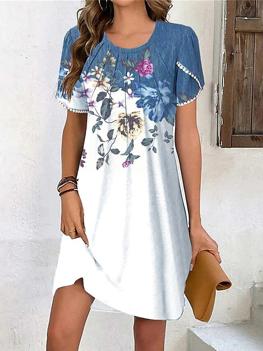 Robe d'été pour femmes avec un design floral créatif et une coupe asymétrique Chic und Stil