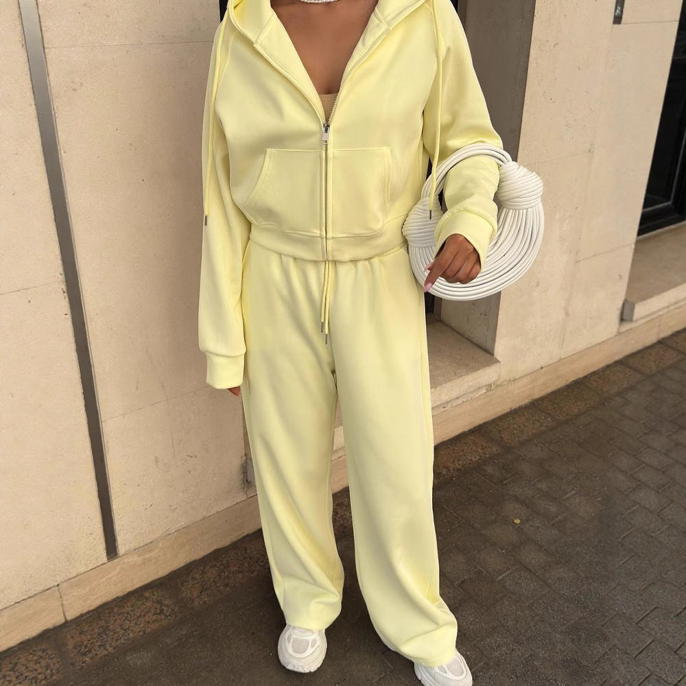 Women's sports leisure set with a trendy cropped hoodie and chic wide-leg pants.