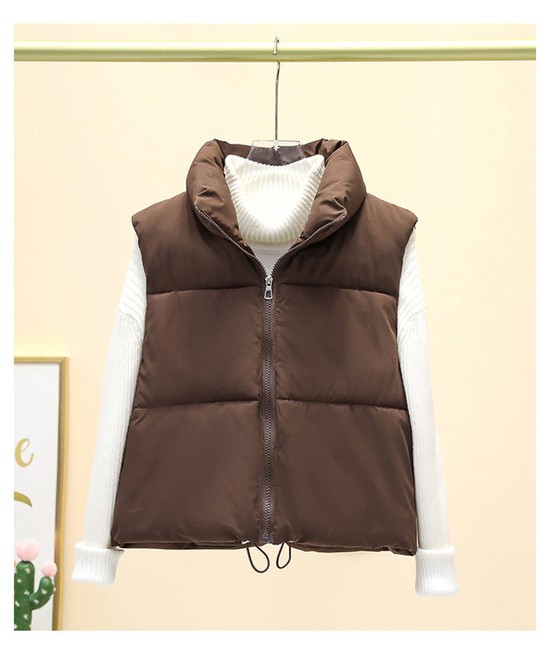 Dames gilet matelassé avec col haut et taille ajustable Chic und Stil