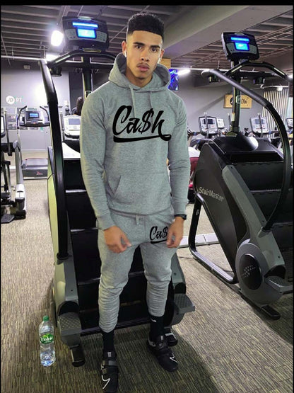 Women's sporty hoodie and jogger pants set with catchy inscription Chic und Stil