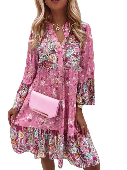 Robe blouson élégante pour dames avec design floral et volants Chic und Stil