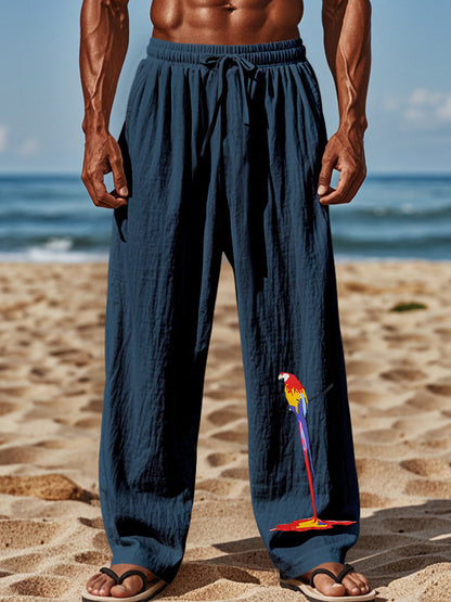 Light beach pants for men with colorful parrot design Chic and Style
