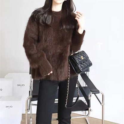 Femmes Pull en peluche à col rond avec coupe décontractée et taille oversize Chic und Stil
