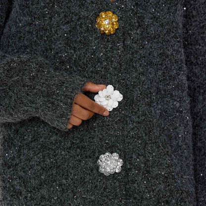 Cardigan pour femmes avec des détails de boutons accrocheurs et un matériau doux Chic und Stil