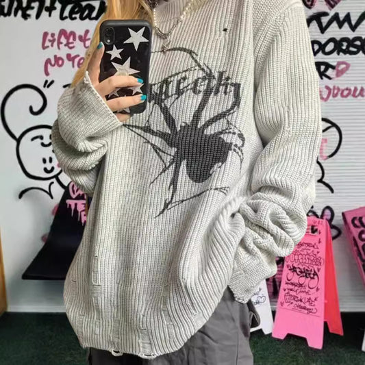 Pull en maille surdimensionné pour femmes avec un motif de araignée frappant Chic und Stil
