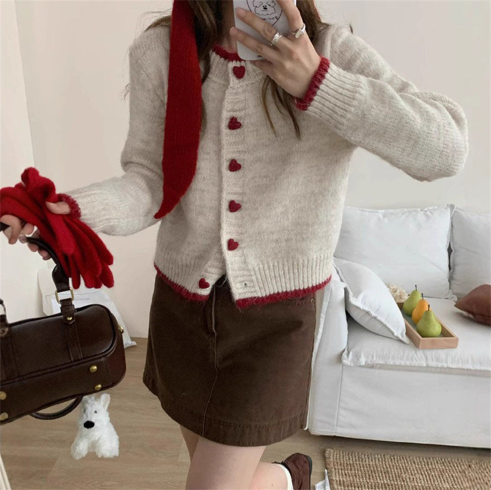 Dames gilet en tricot douillet avec boutons en forme de cœur et conception de manches raffinée Chic und Stil