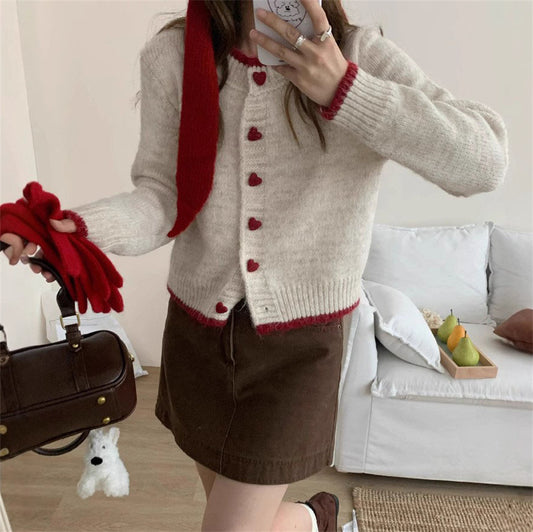 Dames gilet en tricot douillet avec boutons en forme de cœur et conception de manches raffinée Chic und Stil