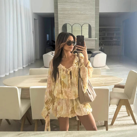 Chemisier en chiffon pour femmes avec un design floral et des manches volumineuses Chic und Stil