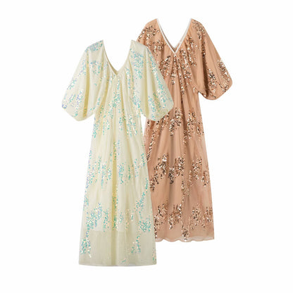 Robe maxi pour femmes avec de volumineuses manches bouffantes et un design en strass floral Chic und Stil