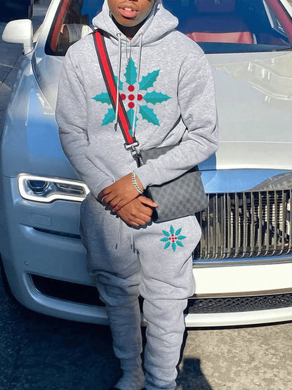 Chic and Style women's hoodie and jogger pants set with winter leaf pattern