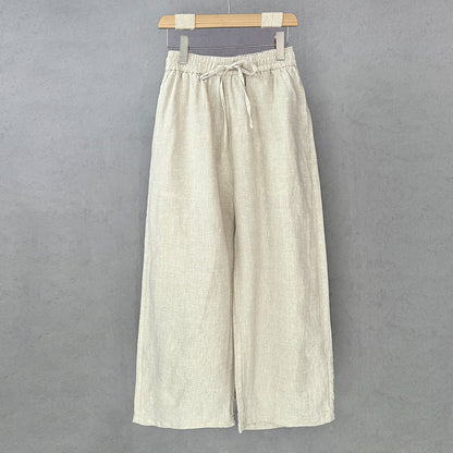 Casual linen pants for women with elastic waist and side pockets with openings.