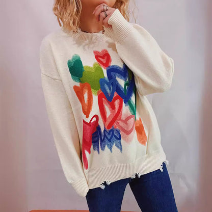 Pull ample de loisirs pour femmes avec motif de cœur coloré et coupe décontractée Chic und Stil
