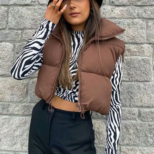 Dames gilet matelassé avec col haut et taille ajustable Chic und Stil