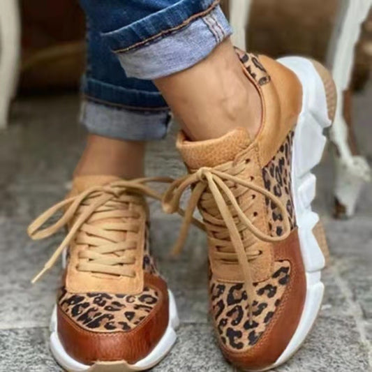 Bottes de course tendance à motif léopard pour dames Chic und Stil