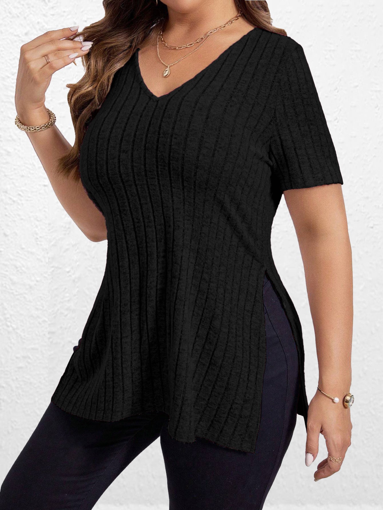 Dames haut décontracté à col en V avec motif en côtes texturé Chic und Stil