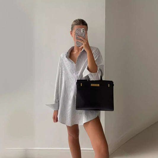 Blouse oversize femmes avec motif à rayures et ourlet arrondi Chic und Stil
