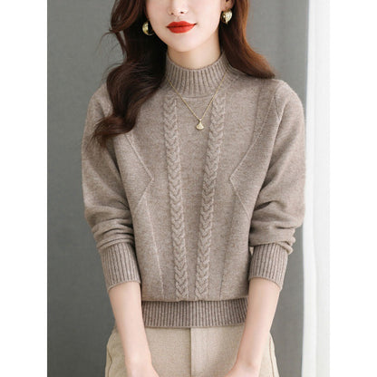 Pull femme en gros tricot avec un élégant motif torsadé et un col haut Chic und Stil