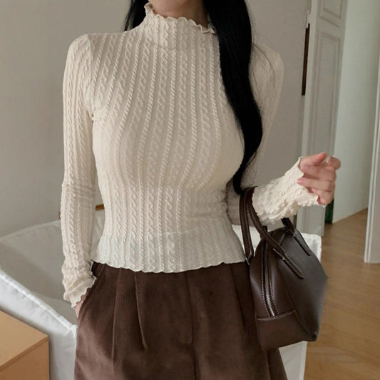 Dames haut à manches longues avec design texturé Chic und Stil