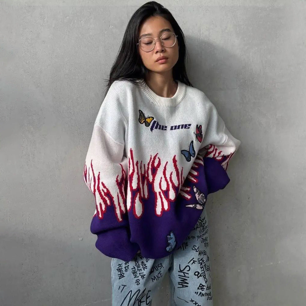 Pull en gros tricot pour femmes avec un design unique de flammes et de papillons Chic und Stil