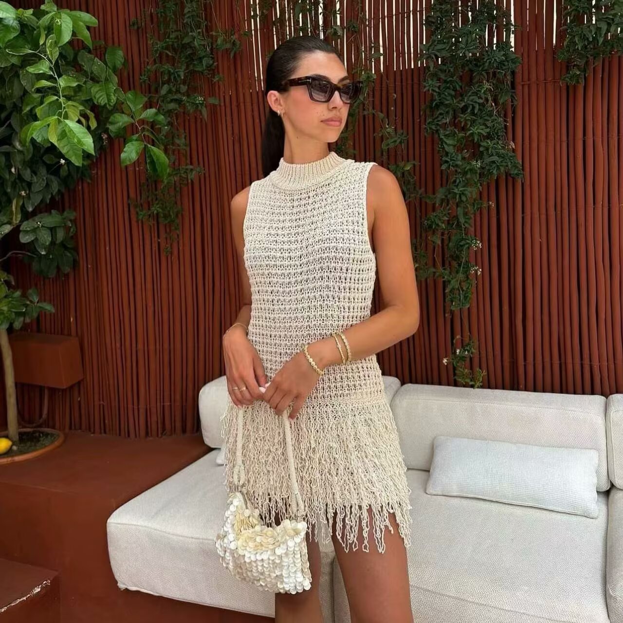 Robe en tricot pour femmes avec franges et design luxueux Chic und Stil
