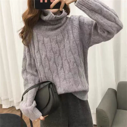 Pull en tricot pour femmes avec col haut et motif en torsades Chic und Stil