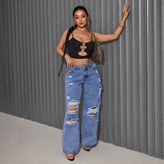 Jean flare femme avec des détails détruits à la mode Chic und Stil