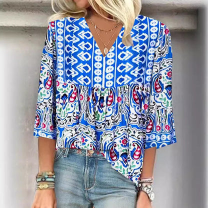 Tunique femme avec un design asymétrique original et un motif floral Chic und Stil