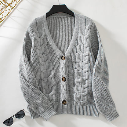 Cardigan pour femmes avec motif en torsade et détails de boutons Chic und Stil