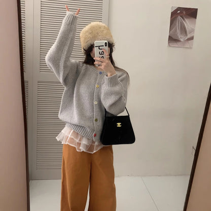Dames Pull-over douillet avec des boutons colorés et coupe décontractée Chic und Stil